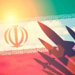 New Iran Threat Emerges Silhouettes of missiles over Irans flag graphic.