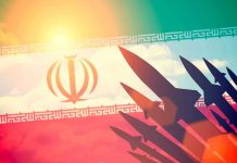 Silhouettes of missiles over Irans flag graphic.