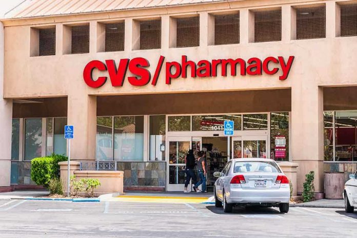 Exterior view of a CVS pharmacy with customers entering