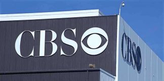 Exterior view of a CBS media building featuring the CBS logo