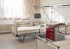 New Federal Crackdown Shakes Hospitals Nationwide A hospital room featuring empty patient beds and medical equipment
