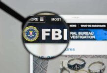 FBI Fraud Probe SILENCED FBI website shown through magnifying glass.