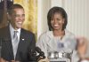 Obama Secretly OPPOSED Harris Nomination Former President Barack Obama and Michelle Obama smiling at a public event