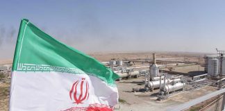 Iran’s Drone Comeback: Faster Than Anyone Expected Iranian flag near an industrial gas refinery.