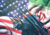 Revolutionary Iran Defies U.S. Sanctions Iran and USA flags with missile launcher.