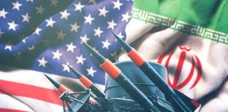 Revolutionary Iran Defies U.S. Sanctions Iran and USA flags with missile launcher.