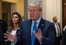 Trump’s Game-Changer: LA Mayor Race Shocker? Man speaking with hands raised, woman and security behind.
