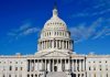 TRUMP VOWS: Cuba Will Fall Soon! US Capitol Building against blue sky.