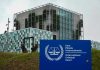 Cuba’s Dark Past: Tribunal Looms? International Criminal Court building with sign in foreground.