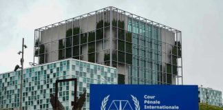 Cuba’s Dark Past: Tribunal Looms? International Criminal Court building with sign in foreground.