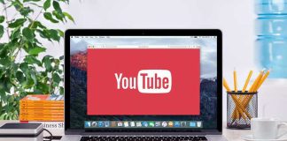 Covert Propaganda Scheme: US Influencers Unwittingly Paid? YouTube logo on a laptop screen on desk.