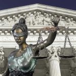 JUSTICE PROBE: Fairfax Prosecutor Caught in Crossfire Lady Justice statue in front of courthouse.