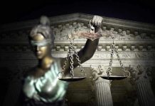 SPLC Scandal: Secret Payments EXPOSED! Blindfolded Lady Justice with scales, Supreme Court background.