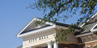 California Mayor’s Shocking Chinese Spy Allegations Exterior view of a city hall building with columns and a clear blue sky