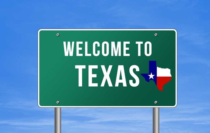 shutterstock_219934720 Welcome to Texas road sign with a Texas map