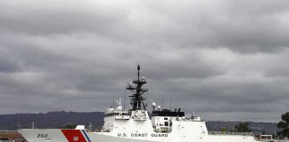 11 Survive Harrowing Ocean Ditch A U.S. Coast Guard ship docked under cloudy skies