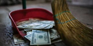 Stanford: $50,000 to Drag Troupe, $10,000 to Veterans Association Broom sweeping dollar bills into red dustpan floor