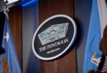 Pentagon Alarm: Israeli Spying Labeled ‘Critical’ The Pentagon emblem between two flags.