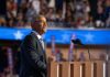 Obama Center Becomes Trump Battlefield A speaker at a podium addressing an audience during a political event