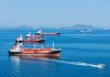 Trump Reopens Protected Waters Several cargo ships navigating in a calm ocean