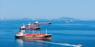 Trump Reopens Protected Waters Several cargo ships navigating in a calm ocean