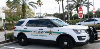 Coroner Conduct That Shocked the Court Sheriff SUV parked in a lot near palm trees
