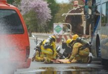Hot Sauce Spill That Caused Chemical Emergency Firefighters assist crash victim between a tanker and bus on a road