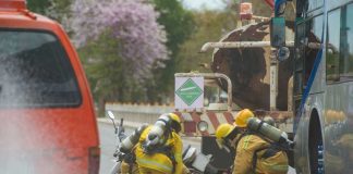 Hot Sauce Spill That Caused Chemical Emergency Firefighters assist crash victim between a tanker and bus on a road