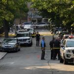 Broad-Daylight Stabbings Jolt Upper West Side Police officers secure a residential street with patrol cars and yellow tape