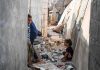 Power Shields Predators In Afghanistan children in a narrow alley with rubble