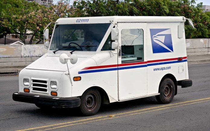 shutterstock_172339019 White USPS delivery truck parked on a street