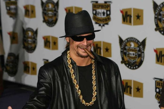Man in black hat and sunglasses with a cigar