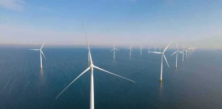 Billion-Dollar Buyouts Gut Offshore Wind Offshore wind turbines in rows over calm sea