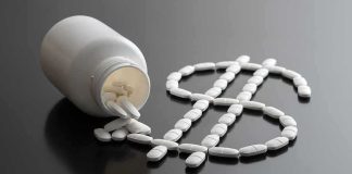The Fight Over Your Prescription Costs Just Got POLITICAL White pills forming a dollar sign beside a spilled pill bottle