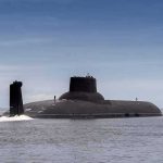 Submarine cruising on calm sea