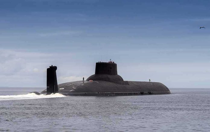shutterstock_647634085 Submarine cruising on calm sea