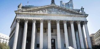 Two Board Seats Just Triggered a Lawsuit Reporters and photographers gathered outside a neoclassical courthouse