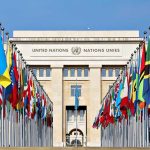 Argentina’s President Says the UN Has One Huge Problem United Nations building with numerous national flags outside.