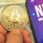 SEC’s Surprising Crypto Door Cracks Open Person holding Bitcoin coin, NFT text on screen.