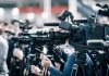 See What HATEFUL Radicals Did to Charlie Kirk’s Statue Broadcast cameras on tripods at a press event