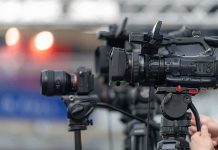 Trump Hails CNN Analyst, Torches Network Professional video cameras on tripods