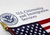 Chris Murphy Gets CORNERED Over Illegal Immigration U.S. Citizenship and Immigration Services document with American flag