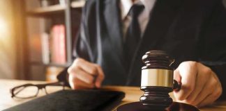 DOJ Files Misconduct Case Against Federal Judges Judge with gavel striking sound block