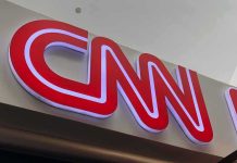 CNN Guest SHUTS DOWN Leftist’s Laughable Take on Capitalism CNN logo sign on a building interior