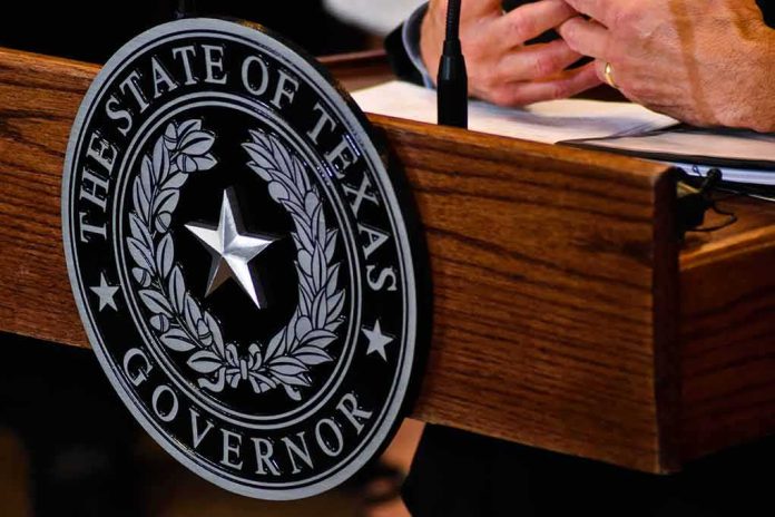 shutterstock_1128379292 Texas governor seal on wooden podium