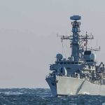 Remote War Creeps Deeper Into Iran naval warship sailing on rough sea
