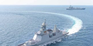 Blockade Or Bust: 100 Ships Rerouted naval warship making a sharp turn at sea