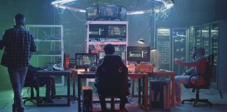 Superintelligence Soon—Musk Bets Big People working at computers in a dim server room