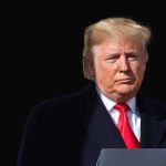 Trump Denies Stunning China Weapons Claim Donald Trump at a podium with a microphone