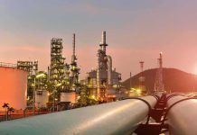 Trump Official Reveals How 30 MINUTES Changed Venezuela Oil Oil refinery with pipelines at sunset